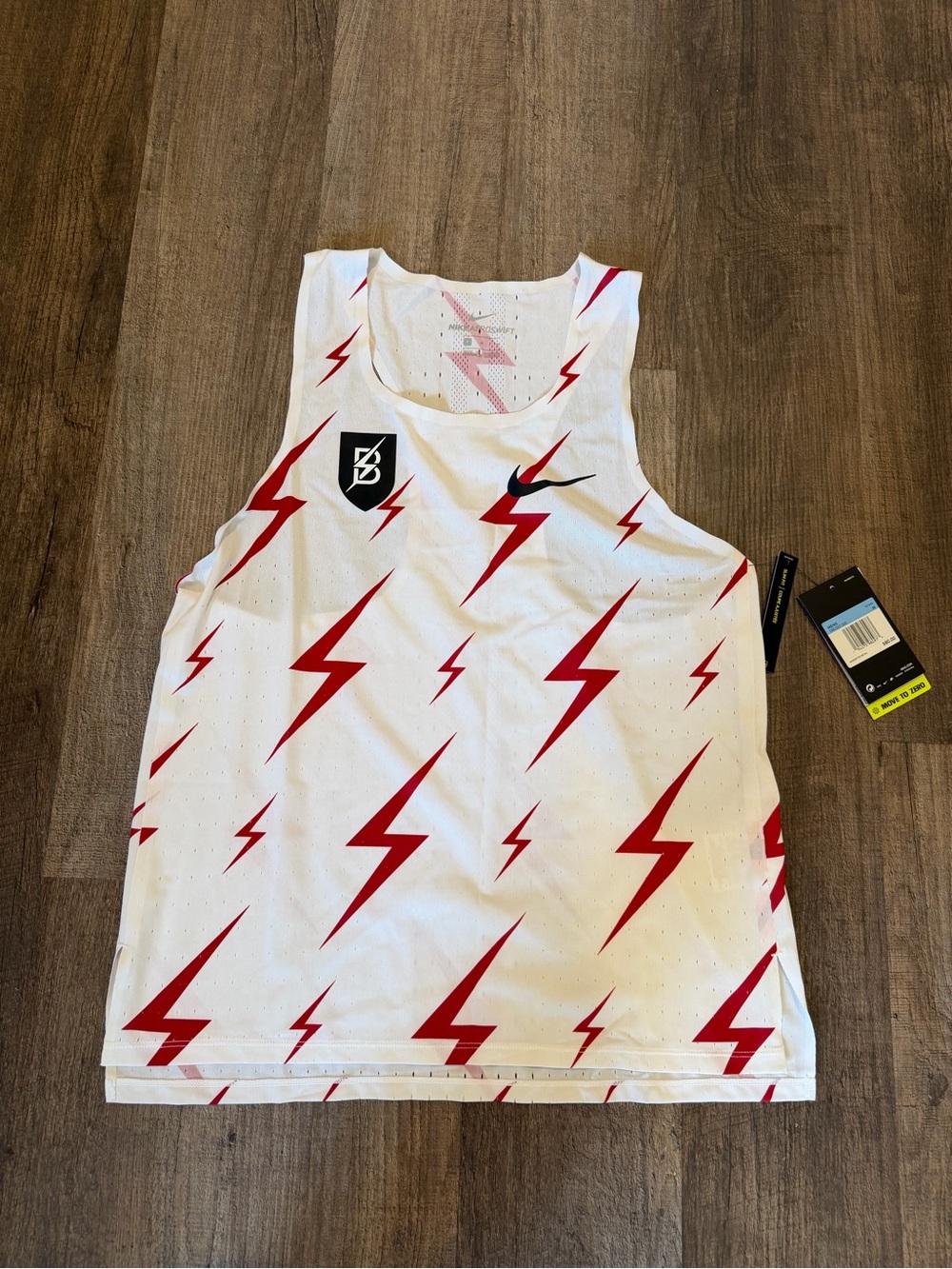 Nike AeroSwift Bowerman Running Singlet.
- Size M Men.